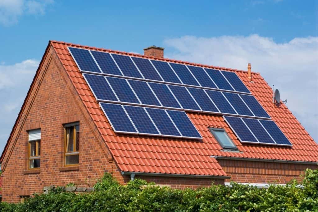 A steep pitched roof with solar panels