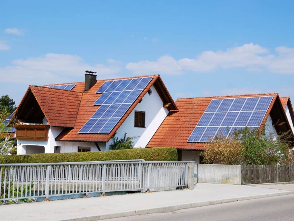 Lots of solar panels on a steep pitch roof