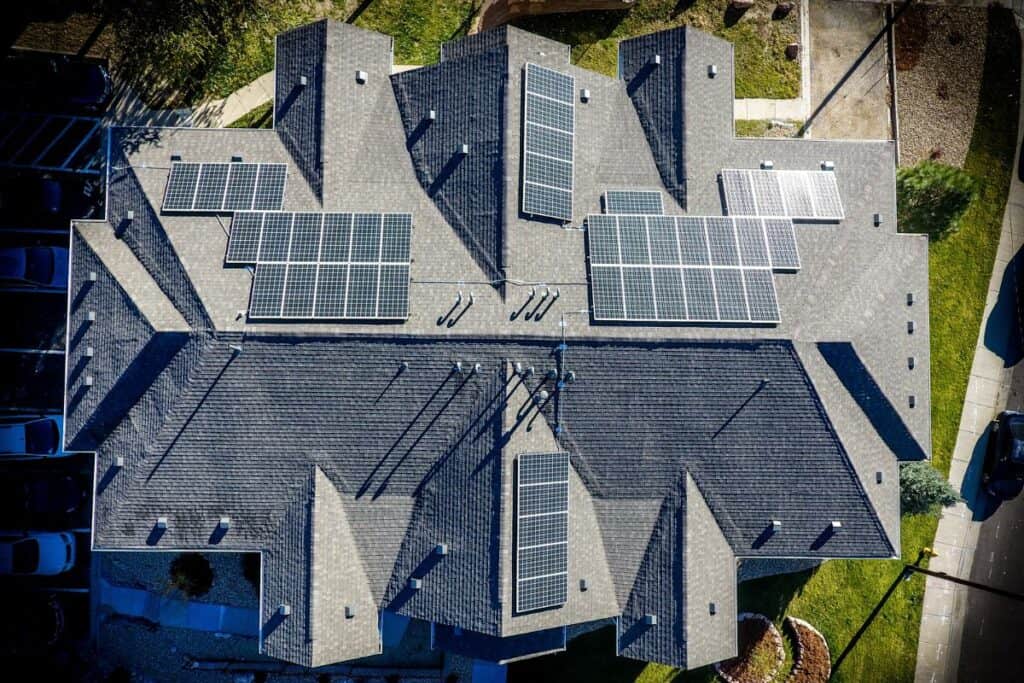 Ariel view of a house with solar panels on the roof