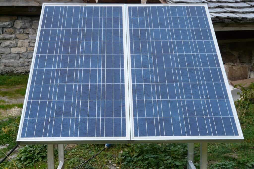 Solar panels on a stand in a yard